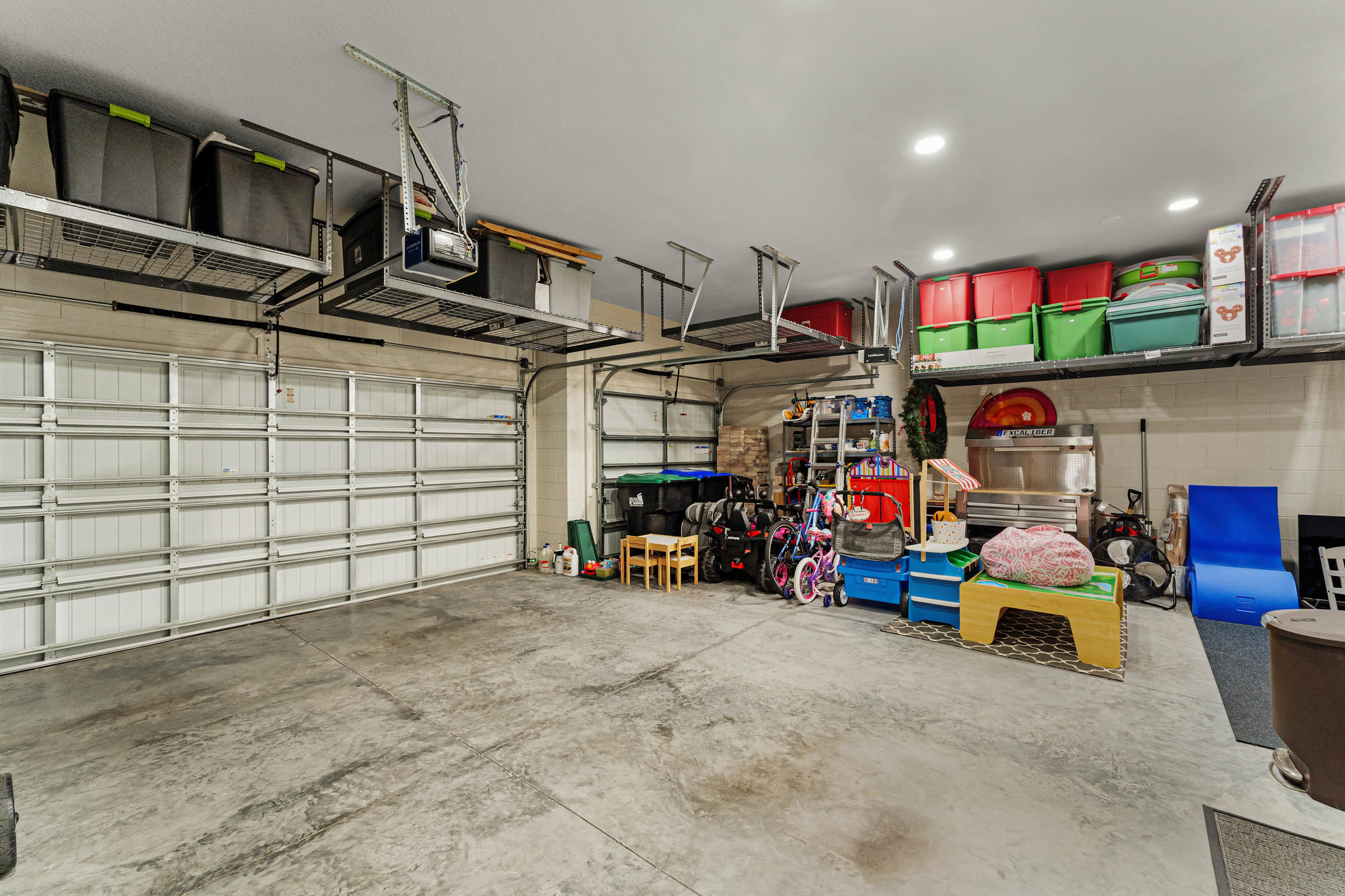 empty garage with storage shelves and bins